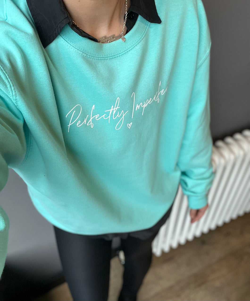 “Perfectly imperfect” mint sweater